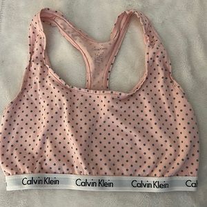 Pink and grey polka dot Calvin Klein sports bra